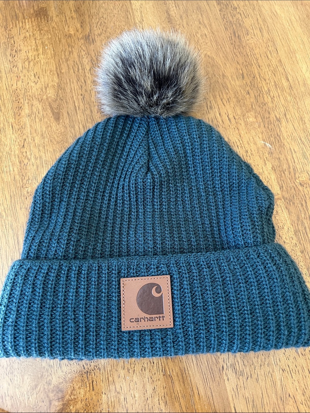 Carhartt Green Ribbed Knit Beanie with Faux Fur Pom. Fall, Winter, workwear.